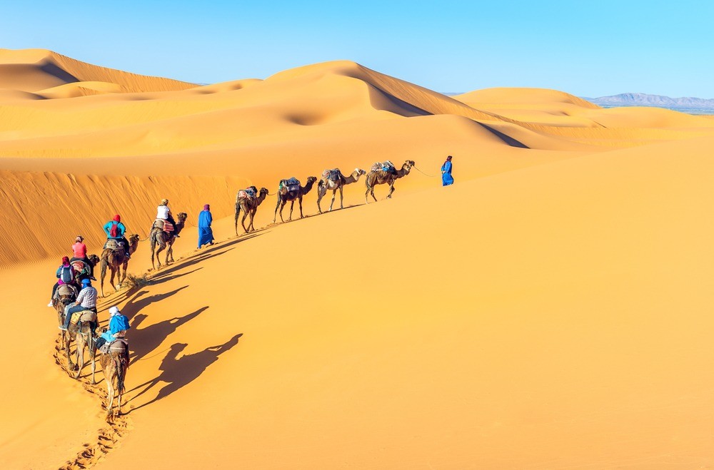 Sahara desert dunes in Morocco at sunset